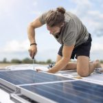 man installing a DIY solar panel kit